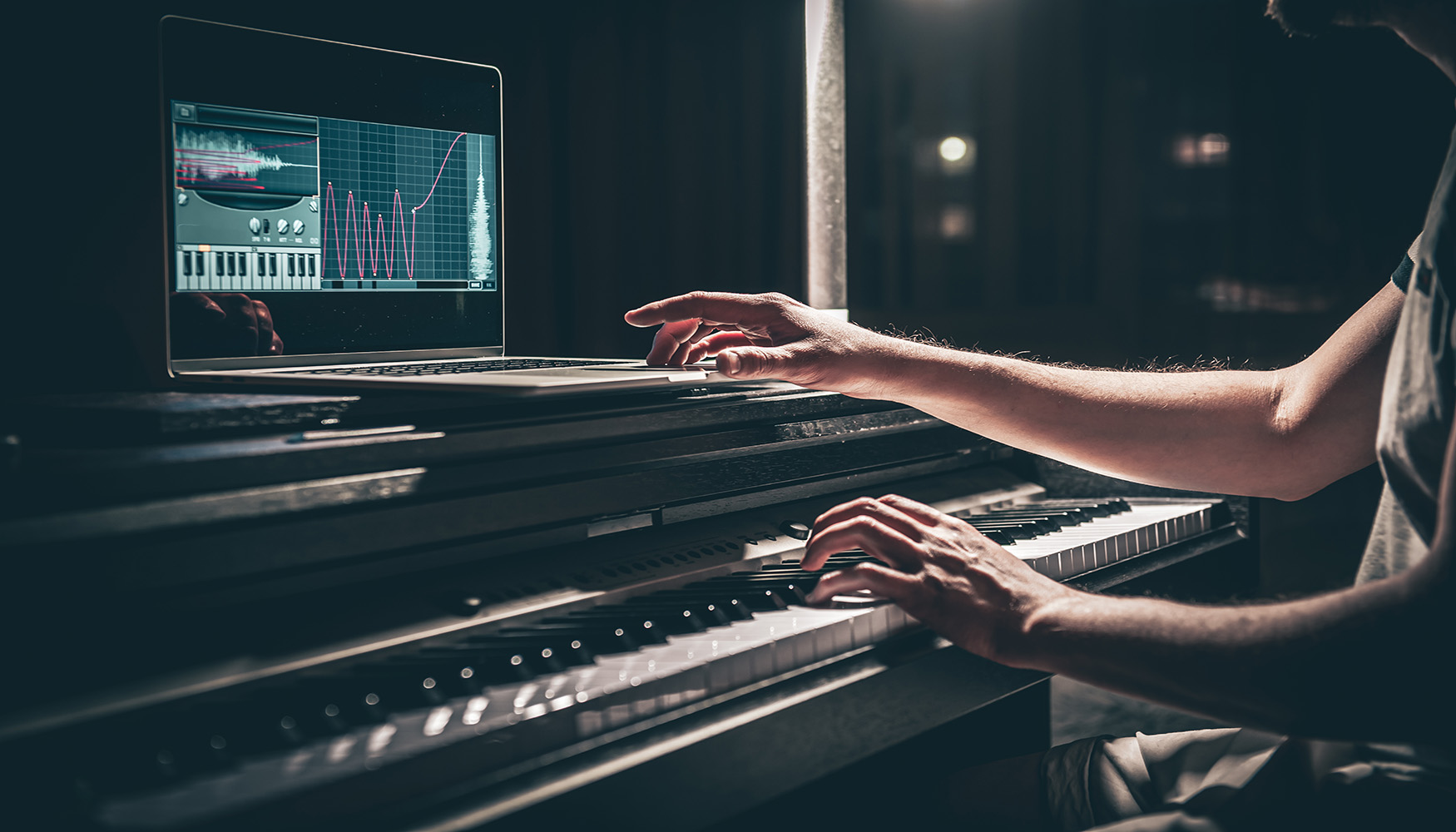 A man composer, producer, arranger, songwriter, musician hands arranging music on a computer at home studio, music production concept.
